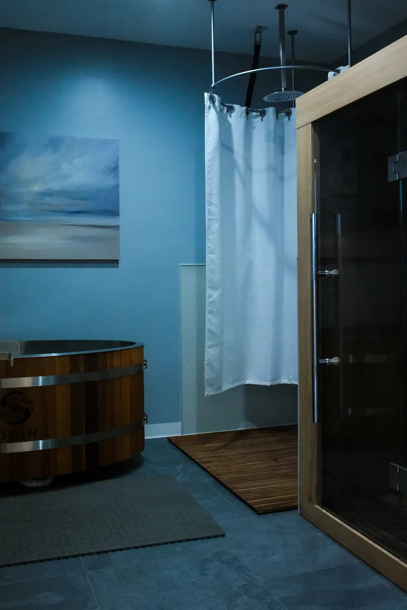 The cold plunge in the studio recovery area, beside the infrared sauna